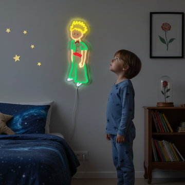 Child looking at a neon light figure of little prince in a room with books and a bed.