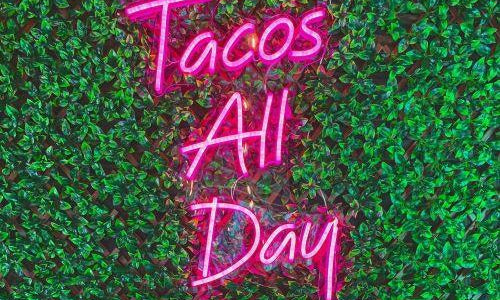 led neon sign tacos all day in restaurant