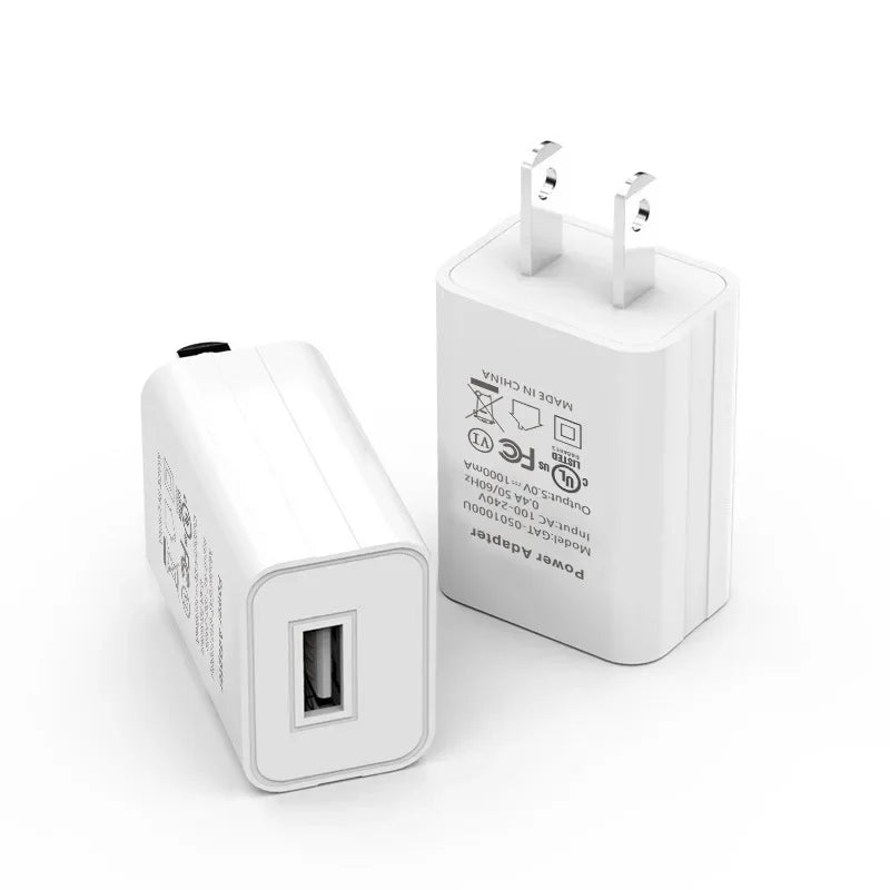 White USB-A wall charger shown from front and side